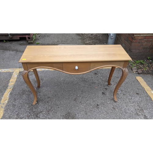 218 - A Coach oak French style console table with a drawer, on cabriole legs, 78cm h x 130cm w
Location: S... 