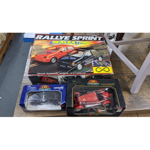 245 - Scalextric Rallye Sprint, not with original cars, with the Batmobile and Jokers car, together with a... 