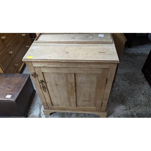 279 - Late Victorian/early 20th century pine side cupboard, twin fielded panelled door, on bracket feet (t... 