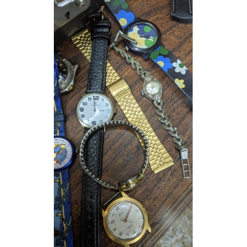 355 - A collection of various ladies and gent wristwatches to include a gents Sekonda on an expanding stra... 