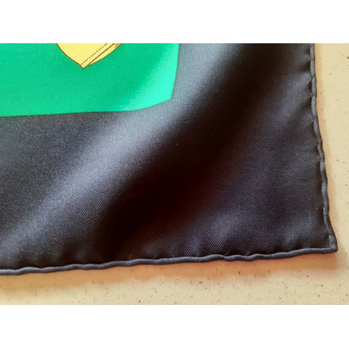 6 - Hermes- A 1980's green and navy silk 'Eperon d'Or' scarf designed by H. d'Origny with gold coloured ... 