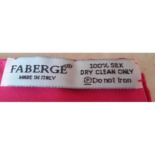 7 - Faberge- A fuchsia and pink silk scarf with green leaves and rambling stems of small white flowers w... 