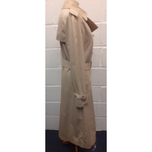 14 - Burberry-A 1970's beige double breasted 'Kensington' lightweight cotton trench coat having brown lea... 