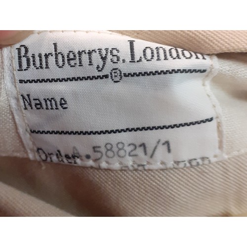 14 - Burberry-A 1970's beige double breasted 'Kensington' lightweight cotton trench coat having brown lea... 