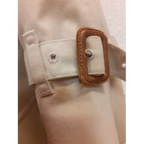 14 - Burberry-A 1970's beige double breasted 'Kensington' lightweight cotton trench coat having brown lea... 