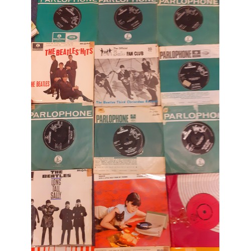 188 - A quantity of 1960's-1980's 45rpm singles to include 7 Beatles on green Parlophone label, The Offici... 