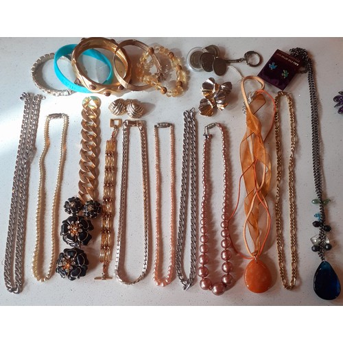 135 - A large quantity of modern costume jewellery comprising earrings, bracelets to include a Rochelle 18... 