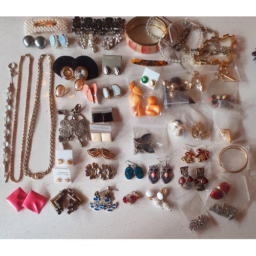 135 - A large quantity of modern costume jewellery comprising earrings, bracelets to include a Rochelle 18... 