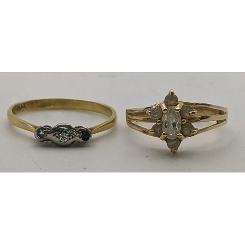 35 - An 18ct gold and platinum ladies diamond ring set with two diamonds (one diamond missing) size M 1/2... 