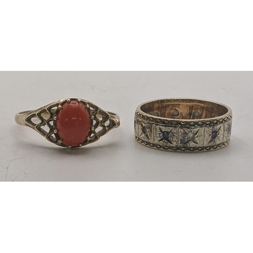 38 - A 9ct gold ring set with a central oval shaped coral, size R, 1.8g, together with a two tone band se... 