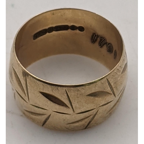 42 - A 9ct gold thick gauge band having an engraved pattern, size J, 4.5g
Location:RING
If there is no co... 