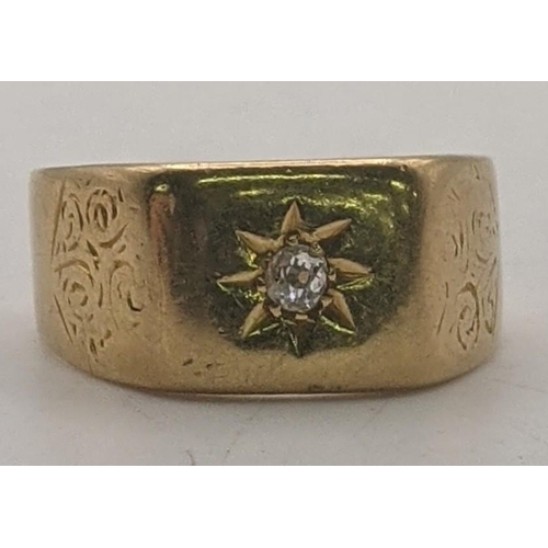 43 - A 18ct gold gents Starburst signet ring set with a central diamond, engraved floral design, size R 1... 