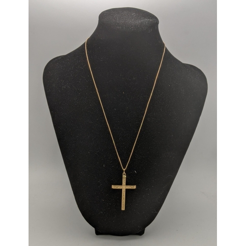 50 - A 9ct gold cross pendant having a floral engraved design, on a 9ct gold box link necklace, 7.2g
Loca... 