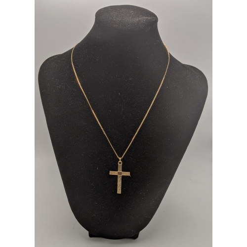 51 - A 9ct gold cross pendant with engraved detail, on a 9ct gold serpentine chain necklace, 4.8g
Locatio... 