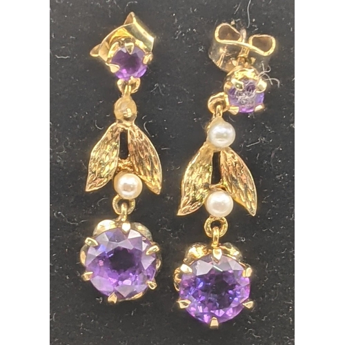 25 - A pair of 9ct gold amethyst and pearl stud earrings 3.1g
Location:CAB6
If there is no condition repo... 