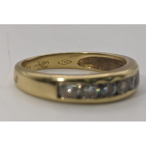 28 - An 18ct gold half eternity ring set with five diamonds and two pace stones A/F 3.5g
Location:CAB8
If... 