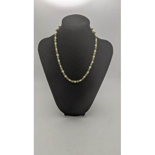 30 - A 9ct gold pearl and jadeite necklace 17.4g, 40cm l
Location:CAB5

If there is no condition report s... 