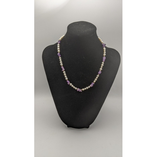 31 - A 9ct cultured pearl and amethyst ladies necklace 42cmL 13.4g
Location:CAB
If there is no condition ... 