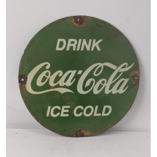 165 - A late 20th century Coca cola enamel advertising sign  38cm diameter
Location: PORT

If there is no ... 