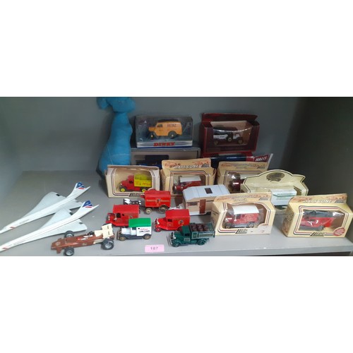 187 - A quantity of late 20th century collectors die cast vehicles in original boxes to include a Dinky He... 