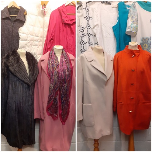 118 - A quantity of modern M&S ladies clothing, mainly coats and dresses sizes XL, UK20 and UK22  to inclu... 