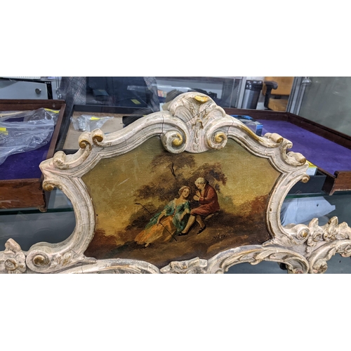 160 - A mid 20th century French Rococo style Trumeau wall hanging mirror inset with an oil on board to the... 