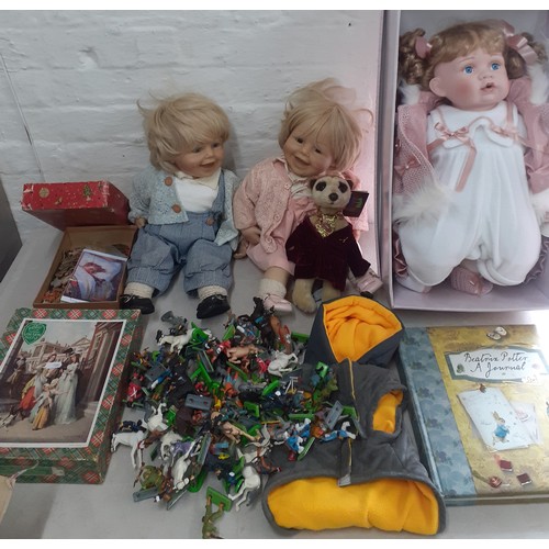 197 - A collection of dolls and vintage toys to include a late 20th century Zapf Collection boy doll and g... 