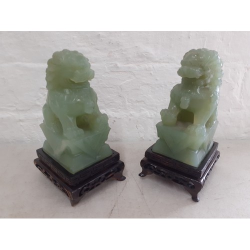 200 - A pair of jadeite dogs of foe on carved stands A/F
Location:9.3
If there is no condition report show... 