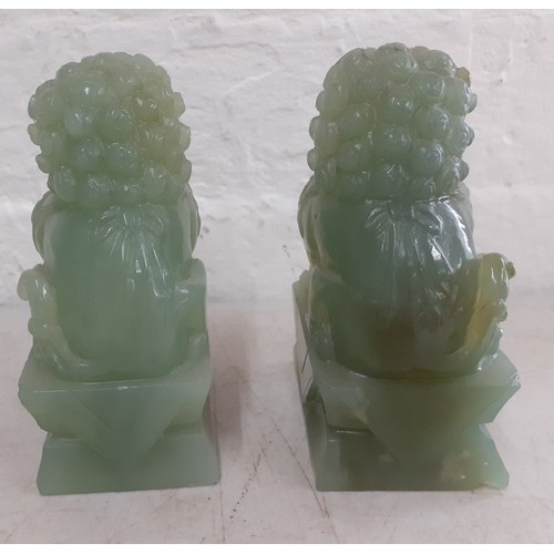 200 - A pair of jadeite dogs of foe on carved stands A/F
Location:9.3
If there is no condition report show... 