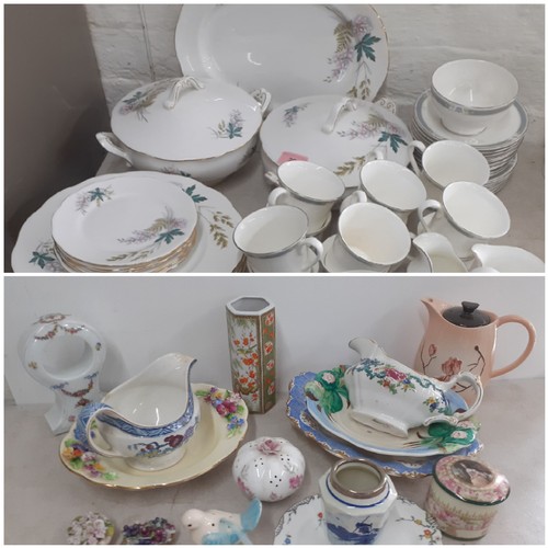 201 - A Queen Anne 'Louise' bone china part dinner service to include two tureens with lids and seven dinn... 