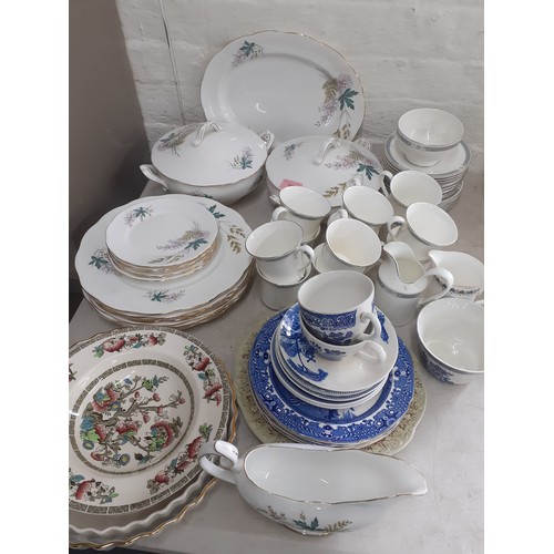 201 - A Queen Anne 'Louise' bone china part dinner service to include two tureens with lids and seven dinn... 