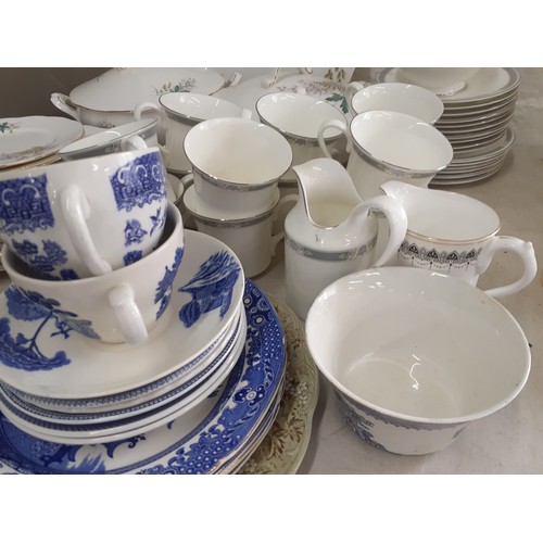 201 - A Queen Anne 'Louise' bone china part dinner service to include two tureens with lids and seven dinn... 