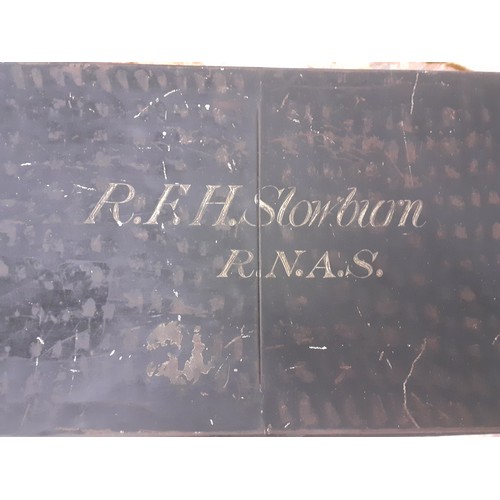 113 - A late 19th/early 20th Century military trunk with red flecks, inscription to lid R.F.H Stowbron R.N... 