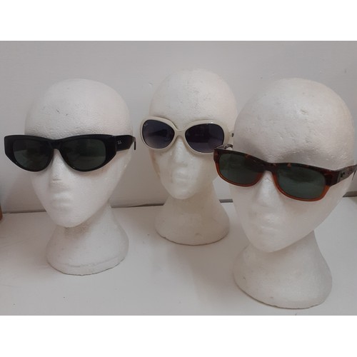 30 - Ray Ban-Three pairs of vintage sunglasses comprising a pair of black 'Dekko' sunglasses, a pair of w... 