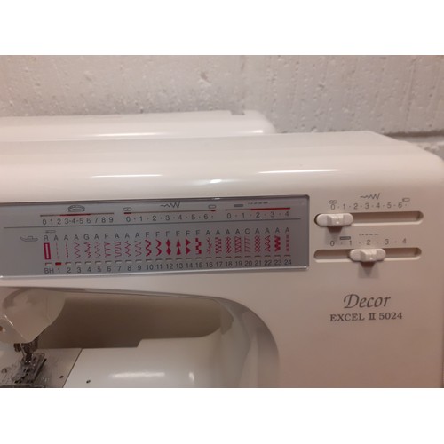 110 - A modern Janome electric sewing machine model Decor Excel II 5024 with case. Location:RWM