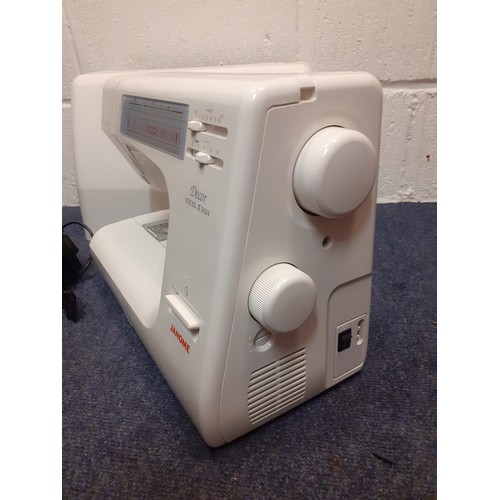 110 - A modern Janome electric sewing machine model Decor Excel II 5024 with case. Location:RWM