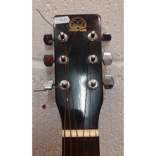 201 - A Hondo acoustic guitar in black serial no: H124BHM with hummingbird design. Location:RWF