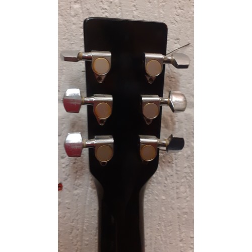 201 - A Hondo acoustic guitar in black serial no: H124BHM with hummingbird design. Location:RWF