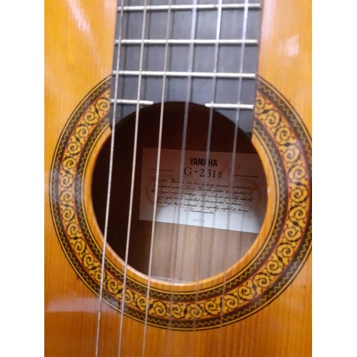 202 - A Yamaha acoustic guitar G-231 II with soft case. Location:RWF