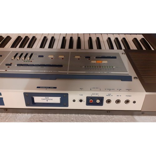 203 - A Korg electric personal keyboard, a super accompaniment system, no leads, serial no:809194. Locatio... 