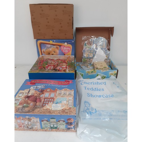 218 - A quantity of Cherished Teddies collectables to include the King and Queens' Collectors Set. Locatio... 