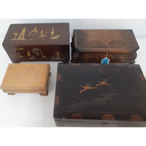 89 - Four vintage jewellery boxes to include a Thorens carved treen musical box playing Faust Waltz and a... 