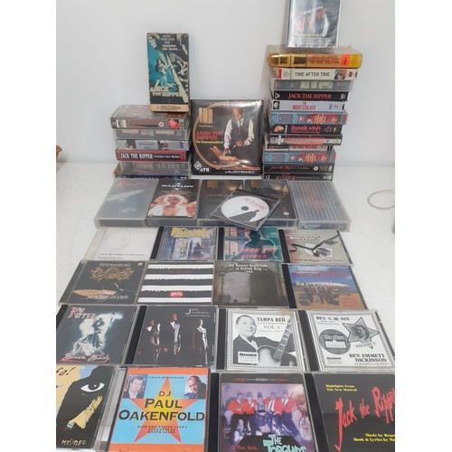 206 - A quantity of Retro VHS tapes, cassette tapes and CD's relating to Jack the Ripper, Ghoulish interes... 