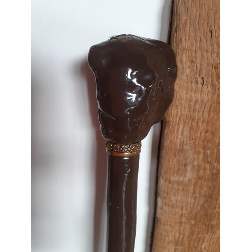 238 - A reproduction of Inspector Abbeline's walking stick with a handle fashioned as a hooded gents head ... 