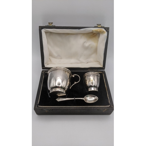 53 - A Jed & S three piece silver Christening silver set, hallmarked London 1948, to include an egg cup a... 