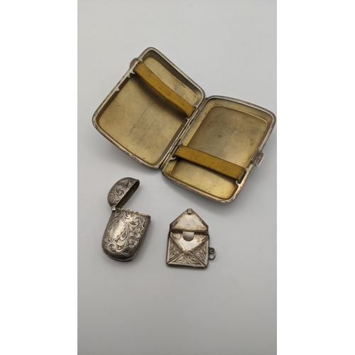 72 - Silver to include an engraved cigarette case, a vesta case and a stamp holder, all having floral eng... 