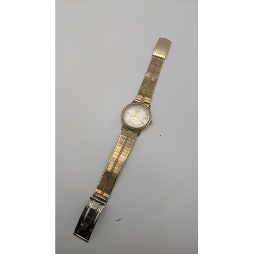 76 - A 9ct gold gent's Rotary wristwatch on a gold plated bracelet Location: CAB 4
If there is no conditi... 