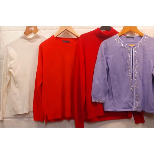 164 - A large quantity of modern ladies knitwear and separates, mainly UK16-18 (not all photographed) to i... 