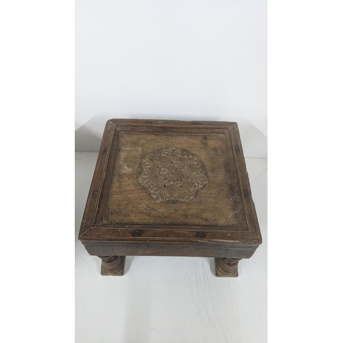 167 - Two 19th century Indian Bajot prayer tables, one decorated with a carved motif to the top
Location: ... 