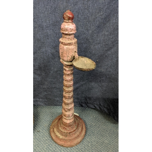 168 - Two 19th century Indian items to include a carved candle stand, 95cm h together with a carved candle... 